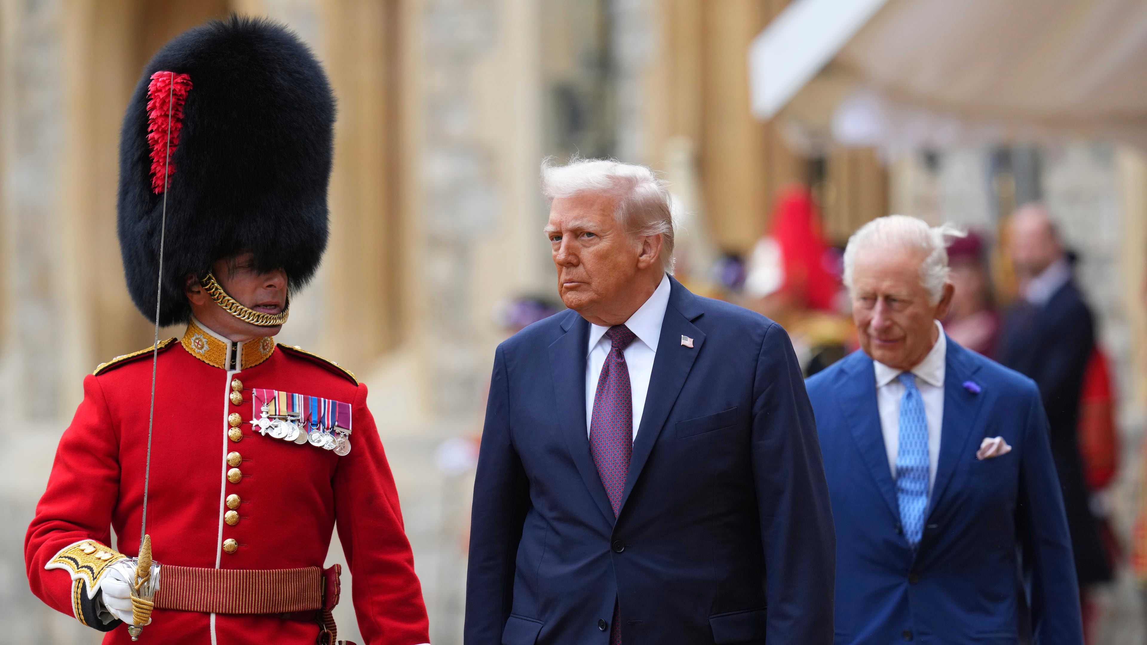 President Donald Trump and Britain's King Charles III review the Guard of Honour after the arrival at Windsor Castle in Windsor, England, Wednesday, Sept. 17, 2025.(AP Photo/Kirsty Wigglesworth, Pool)