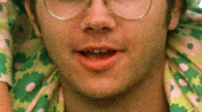 In this 1975 file photo, Mark David Chapman is seen at Fort Chaffee near Fort Smith, Ark. The man who shot John Lennon said he considered killing Johnny Carson and Elizabeth Taylor, but the ex-Beatle was more accessible. Thirty-five years ago on Dec. 8, Chapman shot and killed Lennon, a former Beatles member. (AP Photo/Greg Lyuan, File)