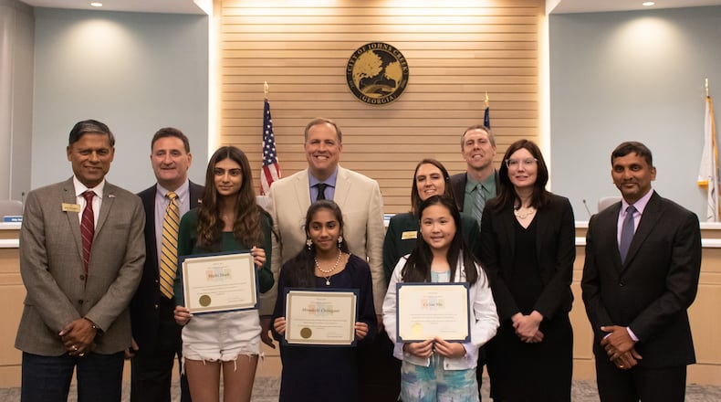 Students winners of the Johns Creek Mayor’s Community Art Competition include Mahi Shah, a junior at Northview High School; Minakshi Chilagani, a sixth-grader at River Trail Middle School and Celine Ma, a fifth-grader from Findley Oaks Elementary School. (Courtesy City of Johns Creek)
