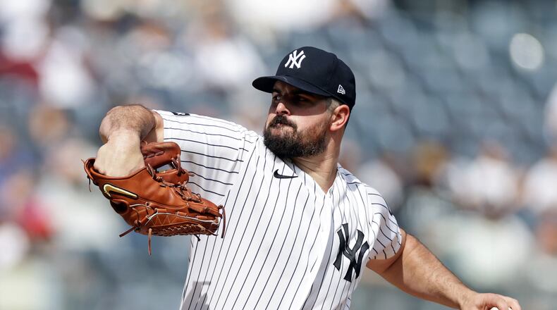 New York Yankees pitcher Carlos Rodon throws in the first inning during the first baseball game of a doubleheader against the Tampa Bay Rays, Tuesday, Sept. 22, 2026, in New York. (AP Photo/Adam Hunger)