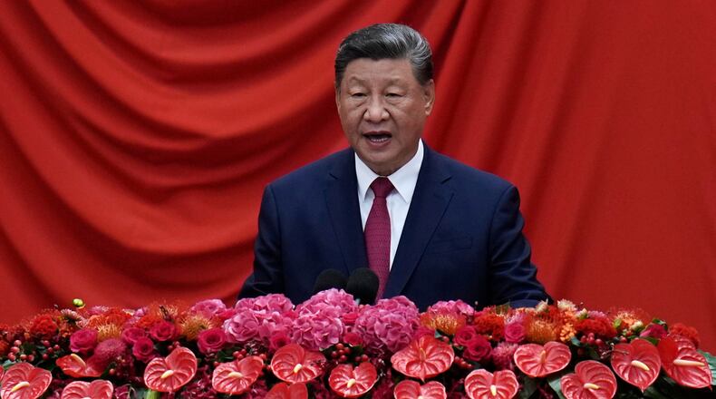 Chinese President Xi Jinping speaks at the National Day Reception at the Great Hall of the People on the eve of the 76th anniversary of the founding of the People's Republic of China in Beijing, Tuesday, Sept. 30, 2025. (AP Photo/Ng Han Guan)