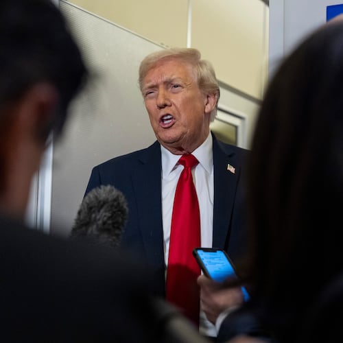 President Donald Trump speaks with reporters while in flight on Air Force One from Joint Base Andrews to his Mar-a-Lago estate in Palm Beach, Fla., Tuesday, Nov. 25, 2025. (AP Photo/Alex Brandon)