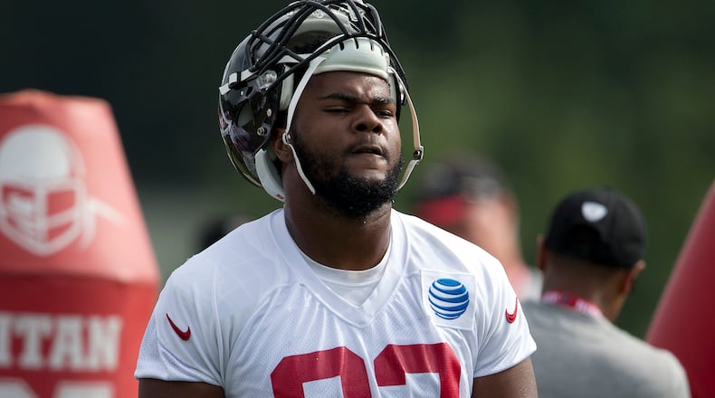 Atlanta Falcons defensive end Chris Odom (93) is shown during the team's NFL training camp football practice Friday, July 28, 2017, in Flowery Branch, Ga. (AP Photo/John Bazemore)
