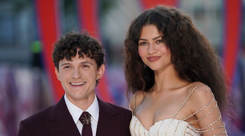 Tom Holland and Zendaya pose for photographers upon arrival at the Spider-Man: Brand New Day premiere in London, England, Wednesday, July 29, 2026. (Photo by Alberto Pezzali/Invision/AP)