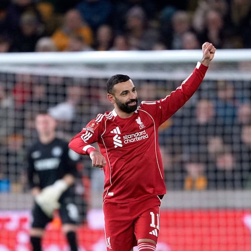 Liverpool's Mohamed Salah celebrates scoring their second goal of the game during an English FA Cup fifth round match against Wolverhampton Wanderers, Friday, March 6, 2026, in Wolverhampton, England. (Peter Byrne/PA via AP)