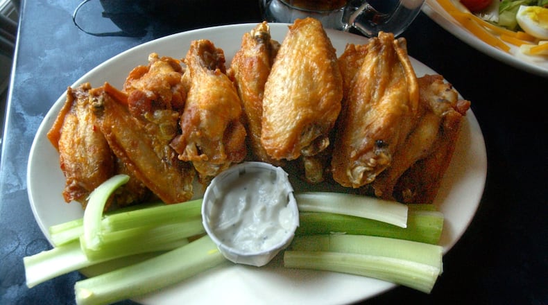 Ahh, chicken wings. Wings have become the priciest part of chickens, a giant part of Georgia’s agricultural business. (NICK ARROYO/AJC staff)