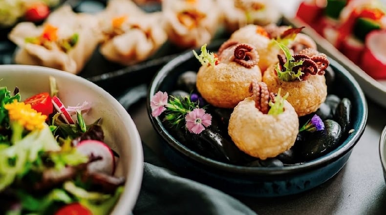 Pickled octopus tentacles peek out of Indian panipuri shells at the Sparrow. (Courtesy of the Sparrow)