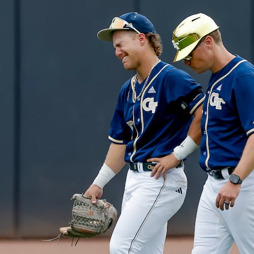 Georgia Tech head coach James Ramsey, right, consoles Drew Burress (8), after Oklahoma hit a solo home run against Tech during the 10th inning to win the NCAA D1 Atlanta Regional elimination baseball game at Russ Chandler Stadium, Monday, June 1, 2026, in Atlanta. (Erik S. Lesser for the AJC)
