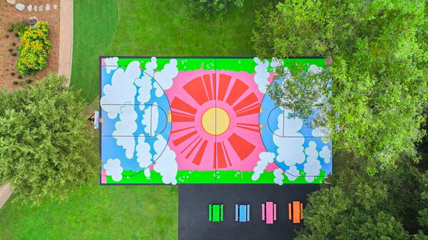 Savannah College of Art and Design alum Alex Waggoner partnered with Art in the Paint to restore the basketball court at Adair Park. Courtesy of SCAD