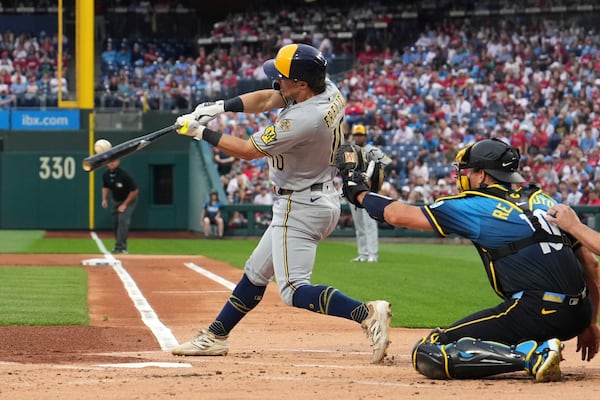 Milwaukee Brewers' Sal Frelick hits a run-scoring single against Philadelphia Phillies pitcher Taijuan Walker during the first inning of a baseball game Friday, May 30, 2025, in Philadelphia. (Matt Slocum/AP)