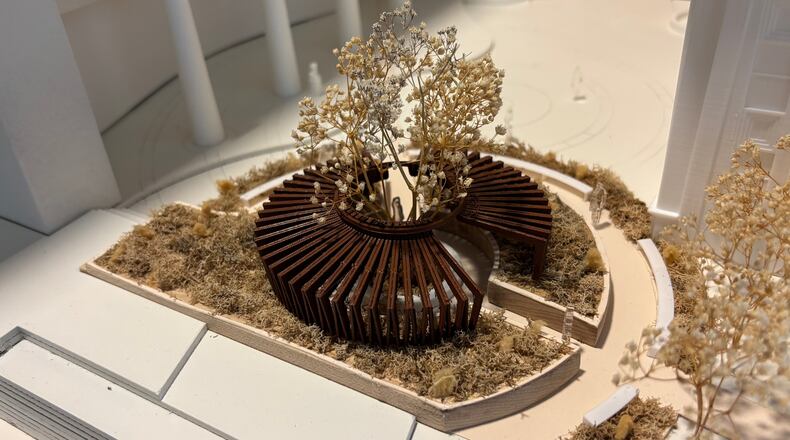 This photo provided by Virginia Commonwealth University shows a model of a memorial and interment site displayed at the VCU Board of Visitors meeting in Richmond, Va., on Thursday, April 23, 2026. (Virginia Commonwealth University via AP)