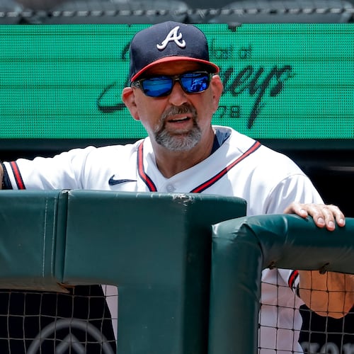 Atlanta Braves manager Walt Weiss watches from the dugout railing during the seventh inning of a baseball game against the San Diego Padres, Thursday, July 23, 2026, in Atlanta. (AP Photo/Erik S. Lesser)