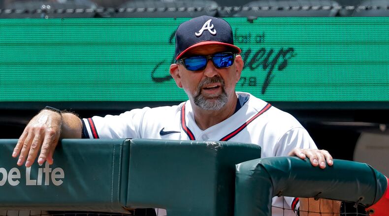 Atlanta Braves manager Walt Weiss watches from the dugout railing during the seventh inning of a baseball game against the San Diego Padres, Thursday, July 23, 2026, in Atlanta. (AP Photo/Erik S. Lesser)
