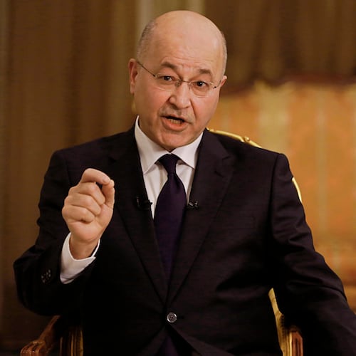 FILE - Iraq's President Barham Salih speaks during an interview with The Associated Press in Baghdad, Iraq, Friday, March 29, 2019. (AP Photo/Khalid Mohammed, File )