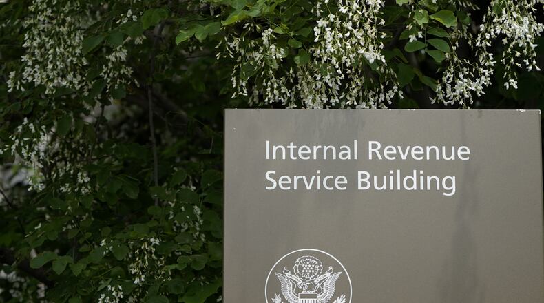 FILE - A sign for the Internal Revenue Service building is pictured in Washington, May 4, 2021. (AP Photo/Patrick Semansky, File)