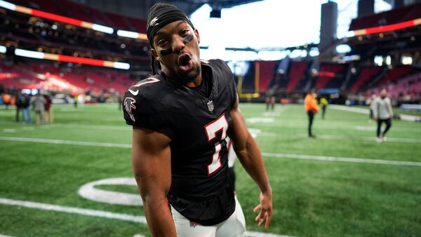 Falcons running back Bijan Robinson celebrates a December win over the Giants.