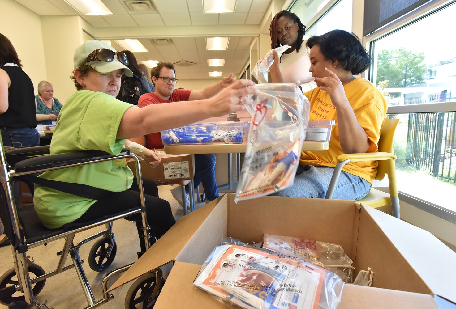 Volunteers prepare for the AJC Peachtree Road Race