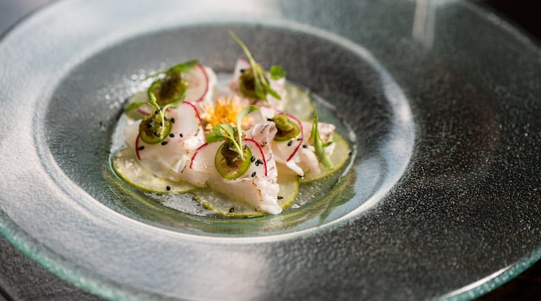 Monkey 68 Red Snapper Carpaccio with red snapper, sweet cucumber, pickled jalapeno, radish, and cilantro. Photo credit- Mia Yakel.