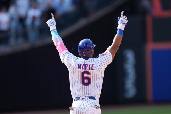 New York Mets' Starling Marte reacts after hitting a walk-off single during the tenth inning of a baseball game against the Philadelphia Phillies, Wednesday, April 23, 2025, in New York. (AP Photo/Seth Wenig)