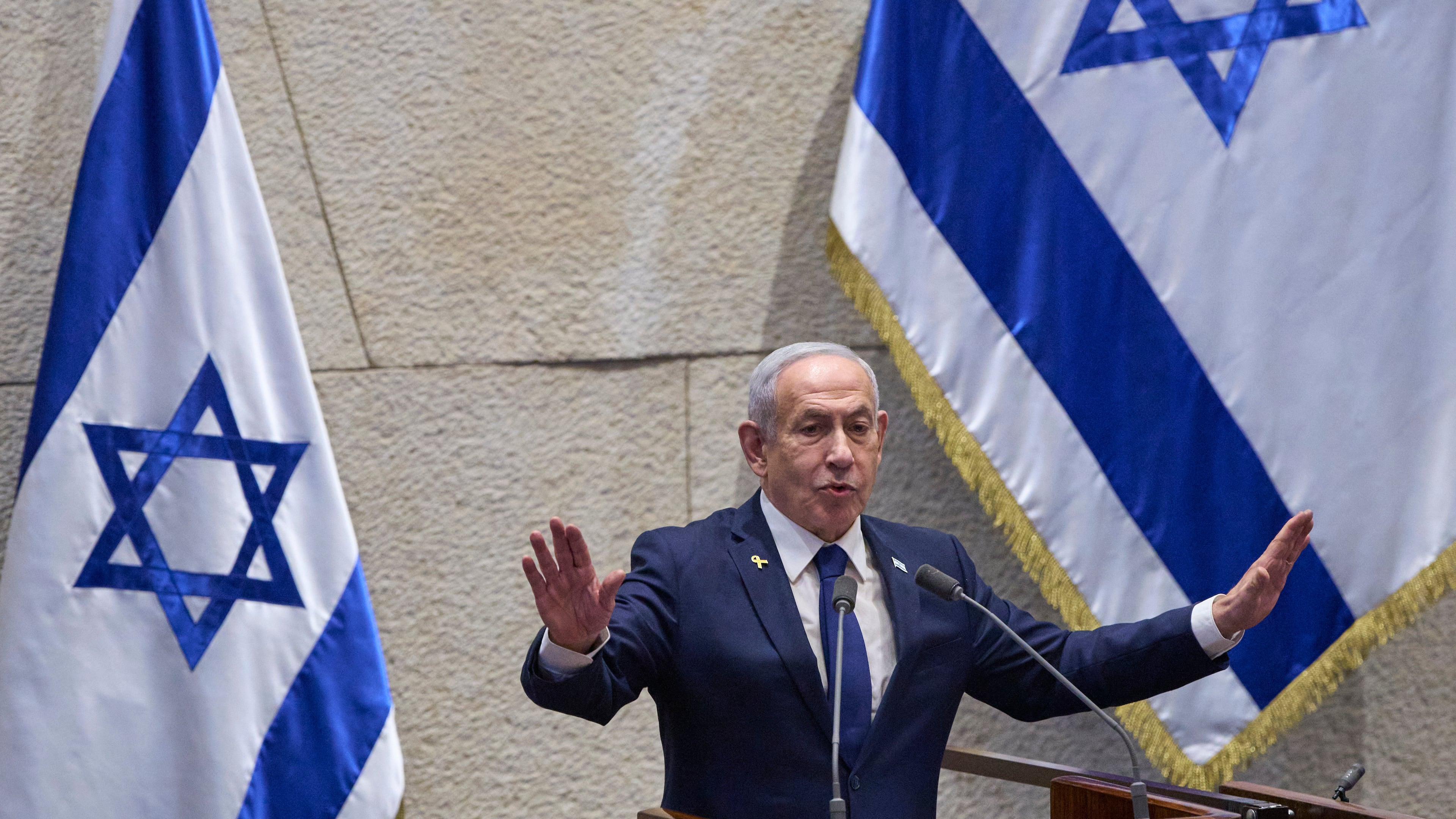 Israel's Prime Minister Benjamin Netanyahu addresses lawmakers in the Knesset, Israel's parliament, in Jerusalem, Monday, Nov. 10 2025. (AP Photo/Ohad Zwigenberg)