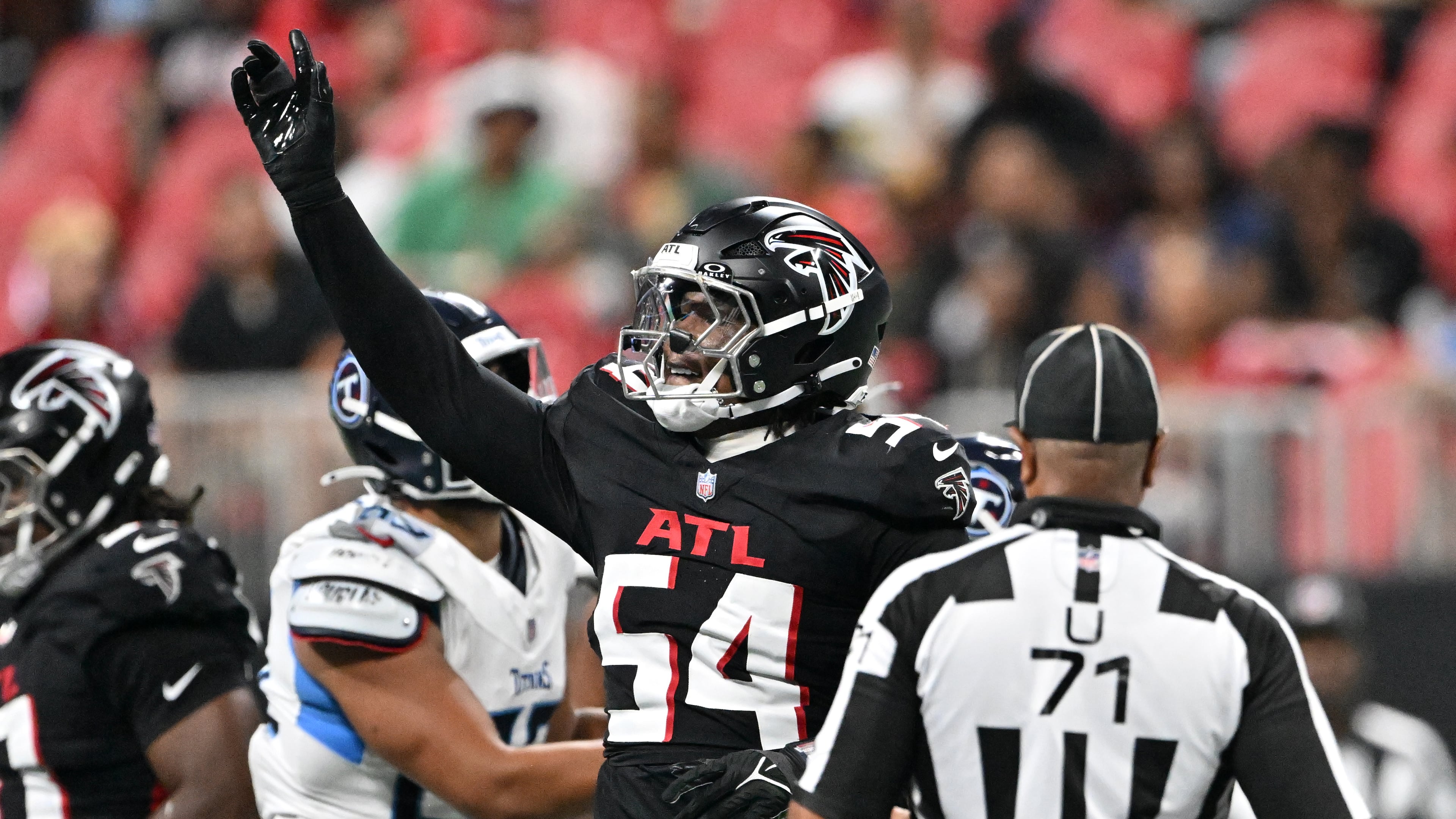 Atlanta Falcons defensive tackle Brandon Dorlus (54) reacts during the second half of an NFL preseason game at Mercedes-Benz Stadium, Friday, August 15, 2025, in Atlanta. The Tennessee Titans won 23-20 over the Atlanta Falcons. (Hyosub Shin / AJC)