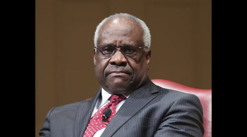 <p> FILE - In this Feb. 15, 2018, file photo, Supreme Court Associate Justice Clarence Thomas sits as he is introduced during an event at the Library of Congress in Washington. When Thomas arrived at the Supreme Court in the fall of 1991 after a bruising confirmation hearing in which his former employee Anita Hill accused him of sexual harassment, fellow justice Byron White said something that stuck with him. “It doesn’t matter how you got here. All that matters now is what you do here,” Thomas recounted in his 2007 memoir, “My Grandfather’s Son.”(AP Photo/Pablo Martinez Monsivais, File) </p>