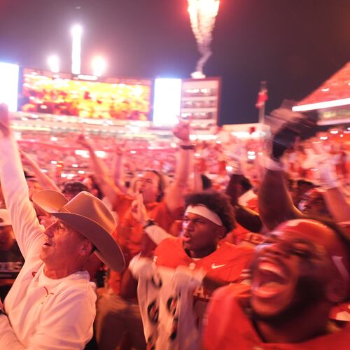 Texas head coach Steve Sarkisian, center and Texas players celebrate their win over Ohio State in an NCAA college football game in Austin, Texas, Saturday, Sept. 12, 2026. (AP Photo/Eric Gay)