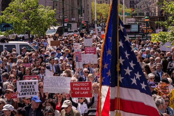 People take part in a May Day rally for the Rule of Law, Thursday, May 1, 2025, in New York. (AP Photo/Adam Gray)
