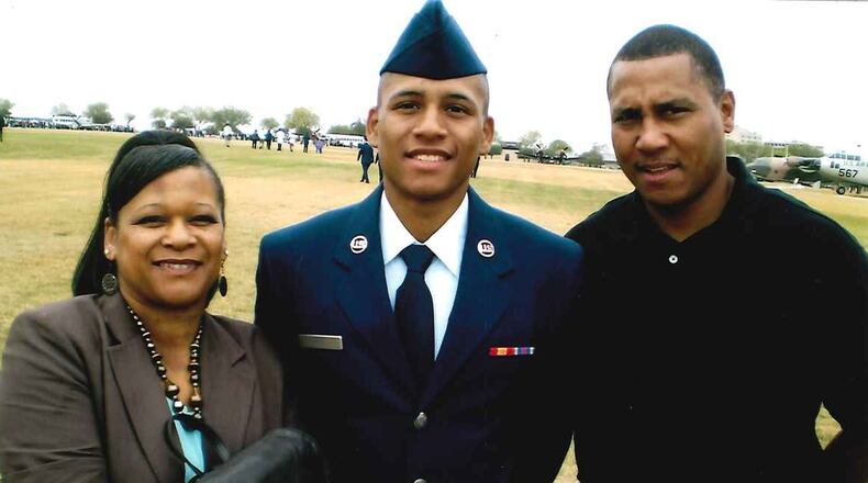Anthony Hill and his parents: Anthony Hill Sr. and Carolyn Baylor Giummo