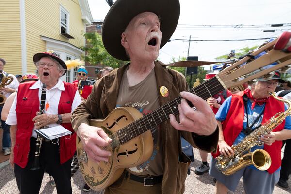T.J. Wheeler sings along with the Leftist Marching Band during a Juneteenth celebration at the African Burying Ground Memorial Park Thursday, June 19, 2025, in Portsmouth, N.H. (AP Photo/Michael Dwyer)