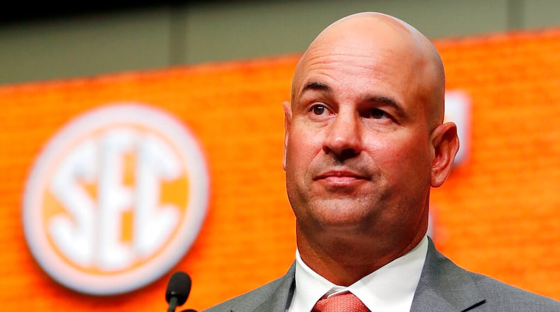 FILE - Then-Tennessee NCAA college football head coach Jeremy Pruitt speaks during Southeastern Conference Media Days in Atlanta, July 18, 2018. The NCAA on Friday, July 22, 2022, charged Tennessee with 18 recruiting violations involving allegations of illegal cash, gifts and benefits given under fired football coach Jeremy Pruitt.(AP Photo/John Bazemore, File)