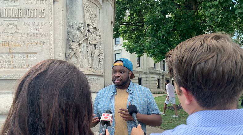 Vauhxx Booker, a civil rights activist and member of the Monroe County Human Rights Commission in Bloomington, Indiana, speaks to reporters Monday after being the target of an "attempted lynching" on the Fourth of July. Booker said a group of white men claimed he was trespassing on private property at Lake Monroe and attacked him and a group of friends who were there to watch an eclipse. One of the five assailants yelled "get a noose" during the alleged attack.