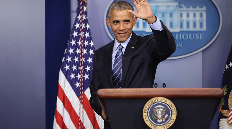 WASHINGTON, DC - DECEMBER 16: U.S. President Barack Obama waves goodbye at the conclusion of a news conference in the Brady Press Briefing Room at the White House December 16, 2016 in Washington, DC. In what could be the last press conference of his presidency, afterwards Obama will be leaving for his annual family vacation in Hawaii. (Photo by Chip Somodevilla/Getty Images)