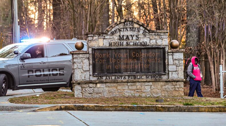 The morning after four students were shot at Benjamin E. Mays High in Atlanta, their classmates returned to school Thursday, Feb. 15, 2024 amid increased security. (John Spink / John.Spink@ajc.com)