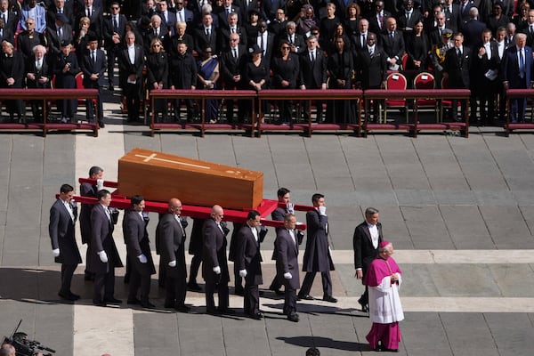 The coffin of Pope Francis is carried into St Peter's Square for his funeral, at the Vatican, Saturday, April 26, 2025. (AP Photo/Evan Vucci)