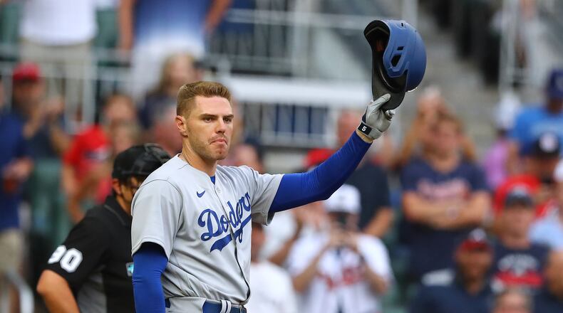 Former Atlanta Braves first baseman Freddie Freeman tips his helmet to fans as he takes the plate to bat in the first inning returning to Atlanta with the Los Angles Dodgers for a MLB baseball game on Friday, June 24, 2022, in Atlanta. The series marks Freeman’s first games in Atlanta since the longtime Braves star signed with the Dodgers as a free agent in March. (Photo: Curtis Compton / Curtis.Compton@ajc.com)