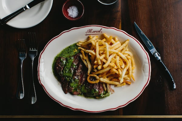 L’Entrecote steak-frites with sauce verte at Marcel. (Courtesy of Marcel/Andrew Thomas Lee.)
