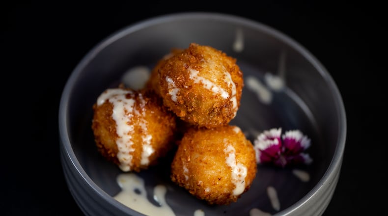 Croquetas at Casa Robles burst with the flavors of serrano ham and manchego cheese. Courtesy of Randi Curling