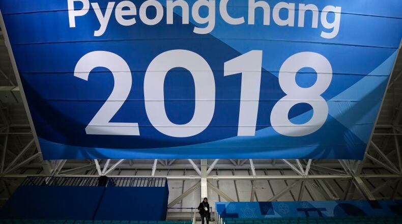A  large banner heralds the 2018 Winter Olympics in South Korea.  (AP Photo/Jae C. Hong, File)