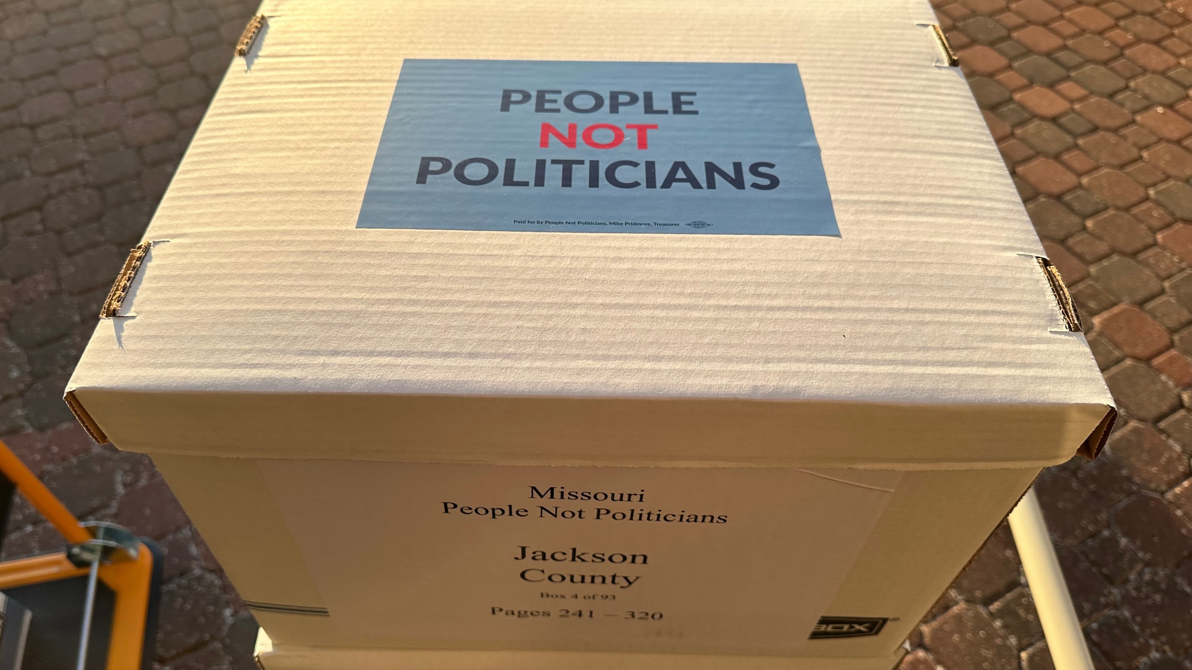 Boxes of petition signatures are stacked up to be delivered Tuesday, Dec. 9, 2025, to the secretary of state's office in Jefferson City, Mo., calling for a referendum election on new U.S. House districts approved by the Missouri legislature. (AP Photo/David A. Lieb)