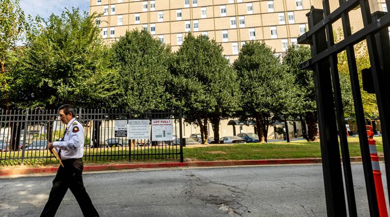 State Fire Marshal Craig D. Landolt finishes an inspection of the apartment complex at 444 Highland Avenue on Friday.