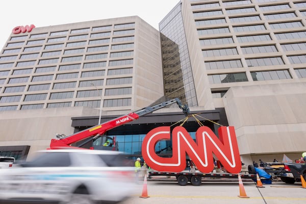 What was a tourist attraction for many years, the CNN symbol was removed by crew workers in March 2024. The famous symbol would find its new home at the Techwood Campus by the Warner Brothers studios in Midtown. (Miguel Martinez/AJC 2024)