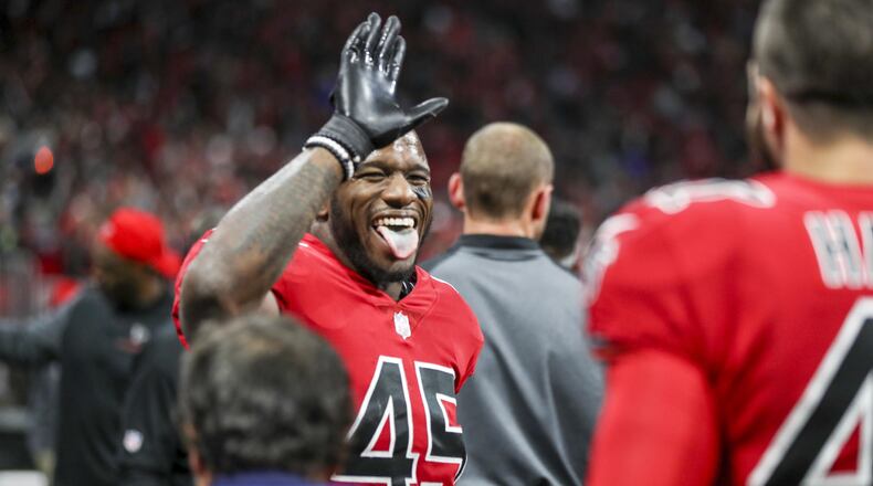 12/07/2017 -- Atlanta, GA, - Atlanta Falcons middle linebacker Deion Jones (45) celebrates after incepting the ball during the fourth quarter of the game against the New Orleans Saints at Mercedes-Benz Stadium, Thursday, December 7, 2017. The Falcons beat the Saints, 20-7. ALYSSA POINTER/ALYSSA.POINTER@AJC.COM