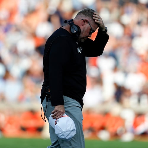 Mercer head coach Mike Jacobs reacts during the first half of an NCAA college football game against Auburn, Saturday, Nov. 22, 2025, in Auburn, Ala. (AP Photo/Butch Dill)