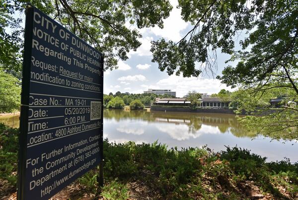 The city of Dunwoody put up public notice signs around the property earlier this year. (Photo: HYOSUB SHIN / HSHIN@AJC.COM)