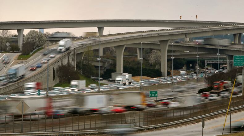 Automobiles travel through Spaghetti Junction Friday afternoon in Atlanta, Ga., March 29, 2013. JASON GETZ / JGETZ@AJC.COM