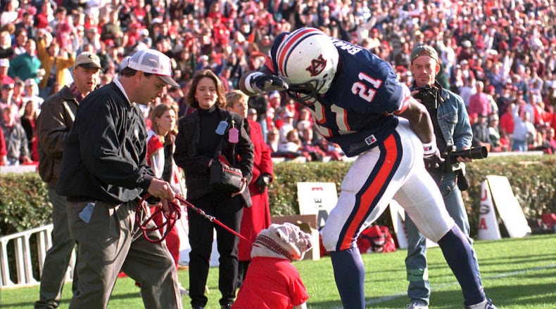 Nothing like a classic two-decades old photo to get you ready for all that Georgia-Auburn entails. (Patricia Miklik/The Montgomery Advertiser via AP)