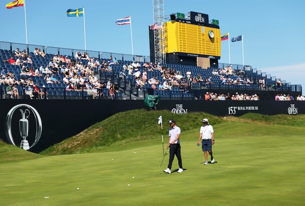 Amateur golfer Frazer Jones of England on the 18th green during a practice round for the 2025 British Open golf championship at Royal Portrush Golf Club, Northern Ireland, Sunday, July 13, 2025. (AP Photo/Peter Morrison)