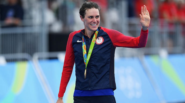 Gold medalist Gwen Jorgensen of the United States celebrates after the Women's Triathlon on Day 15 of the Rio 2016 Olympic Games at Fort Copacabana on August 20, 2016 in Rio de Janeiro, Brazil.  (Photo by Matthias Hangst/Getty Images)