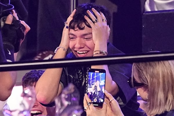 JJ from Austria who performed the song "Wasted Love" reacts to voting during the Grand Final of the 69th Eurovision Song Contest, in Basel, Switzerland, Saturday, May 17, 2025. (AP Photo/Martin Meissner)